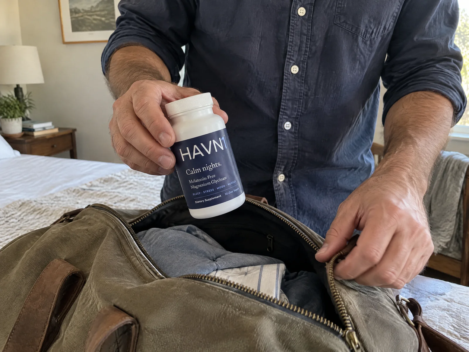 A bottle of HAVN1 being packed into an overnight bag